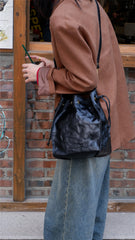 Waxy Leather Drawstring Bucket Bag